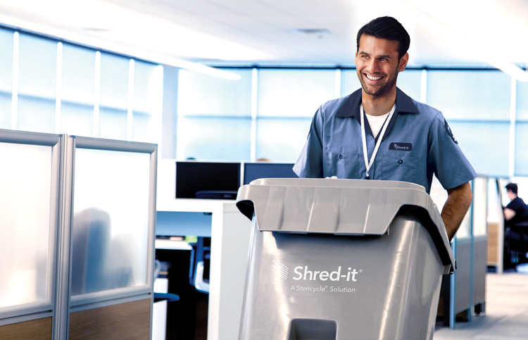 SID-Driver-Pushing-Tote-Through-Office-New-OT-Hero.png, Picture